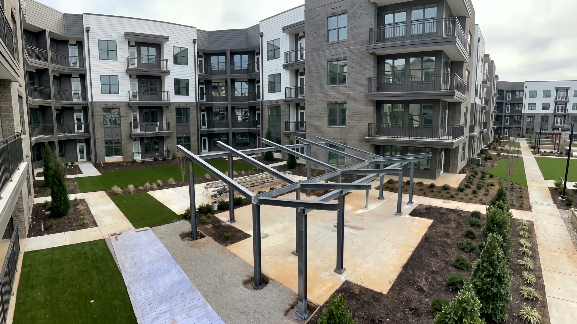 Steel pergola frame erected by More Steel Inc in an apartment courtyard