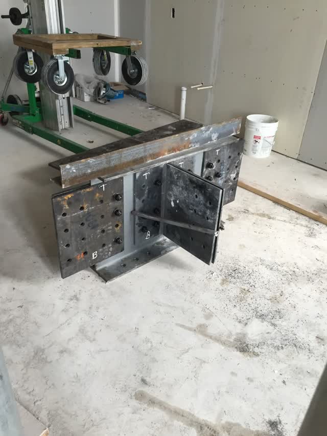 A fabricated steel assembly on rollers ready to leave the shop