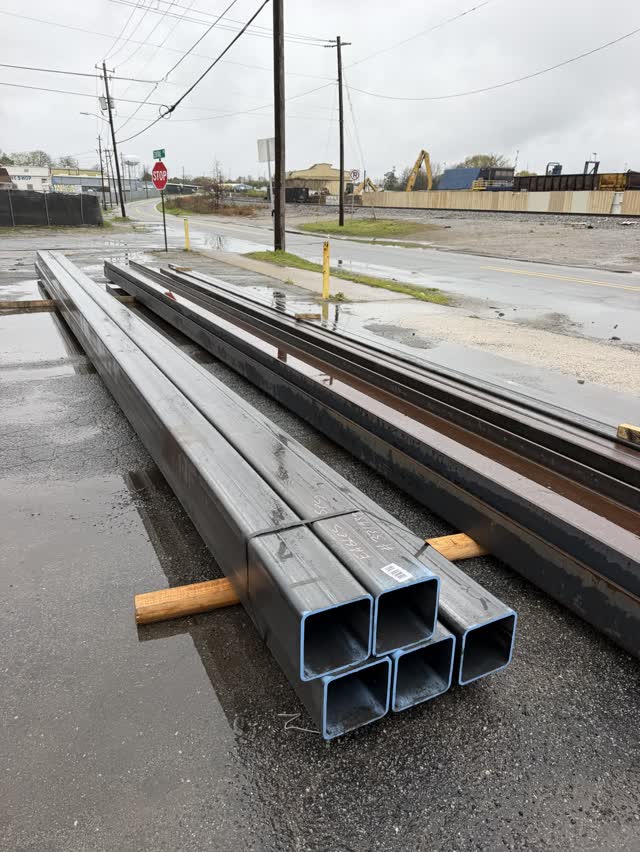 Steel tube and bar stock unloaded at the roadside