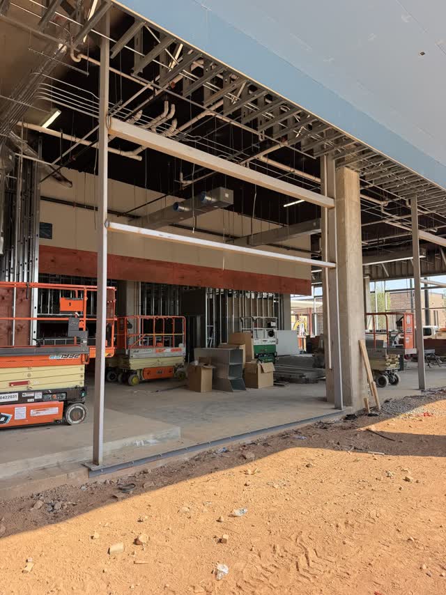 Structural steel framing inside a retail space under fit-out
